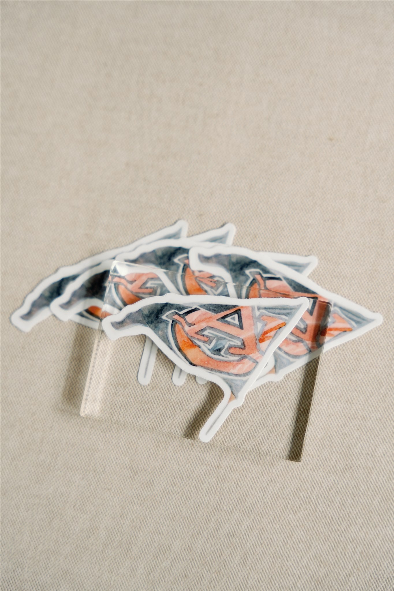 Sticker of a watercolor Auburn flag.