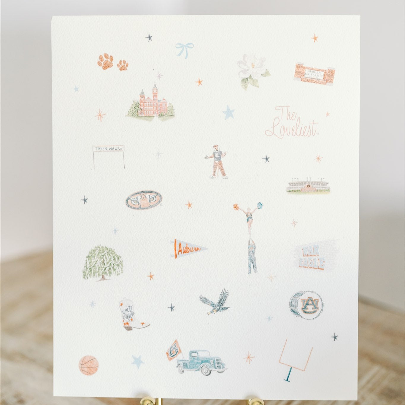 Watercolor art of Auburn symbols.