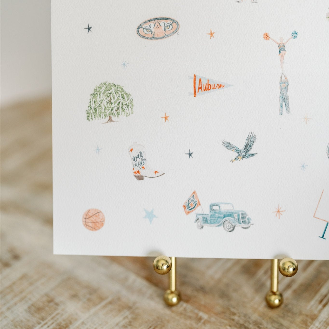 Watercolor art of Auburn symbols.