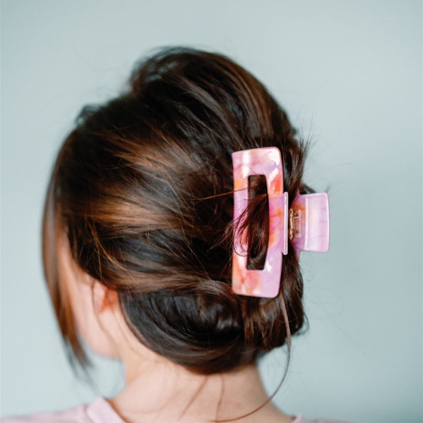 Pink and orange hair claw clip.