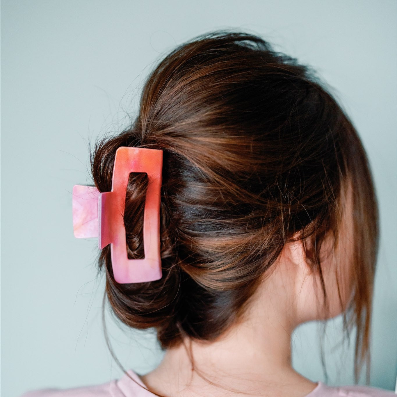 Pink and orange hair claw clip.