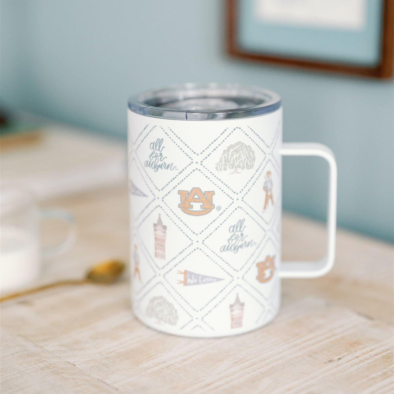 White Insulated Mug with watercolor Auburn University symbols.