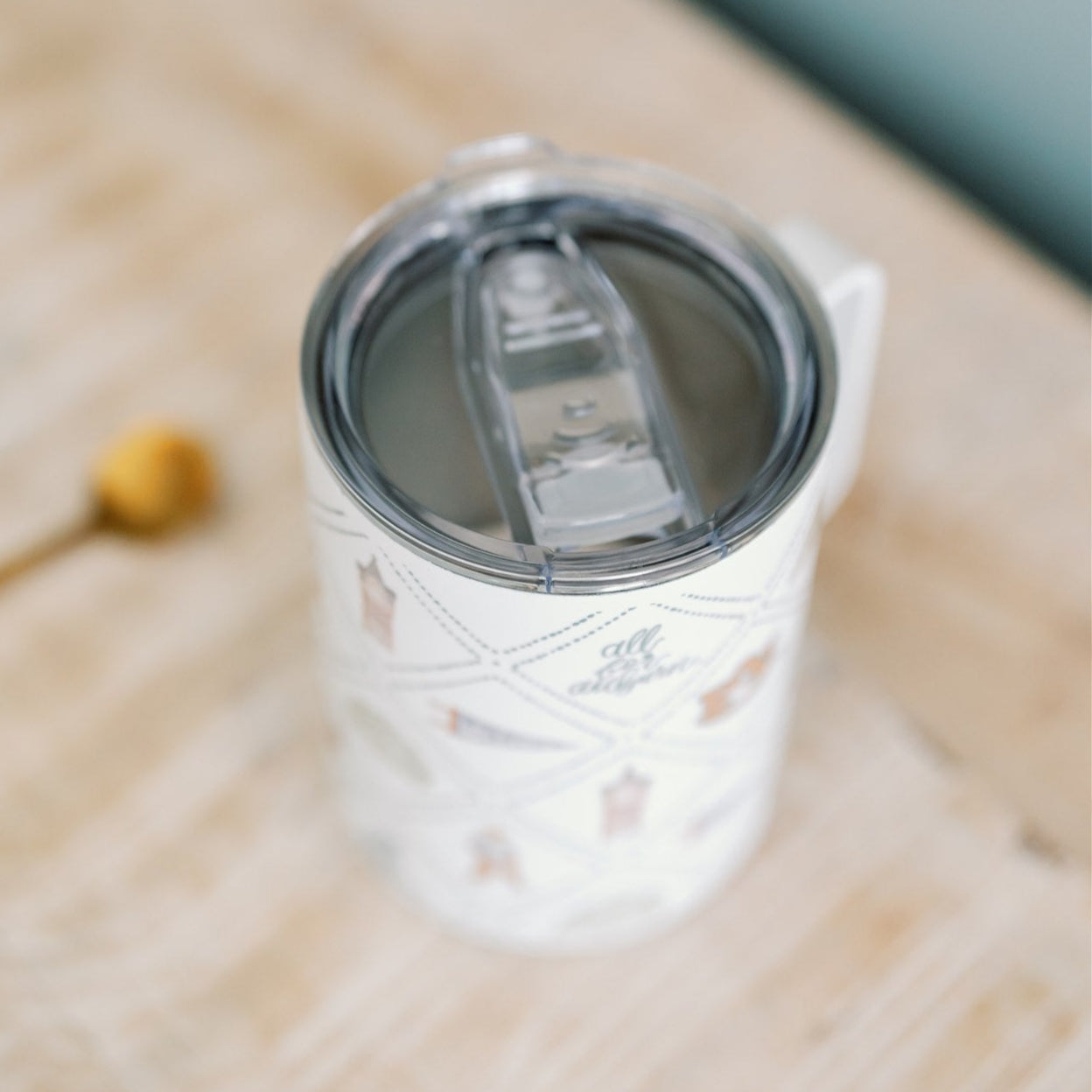 White Insulated Mug with watercolor Auburn University symbols.