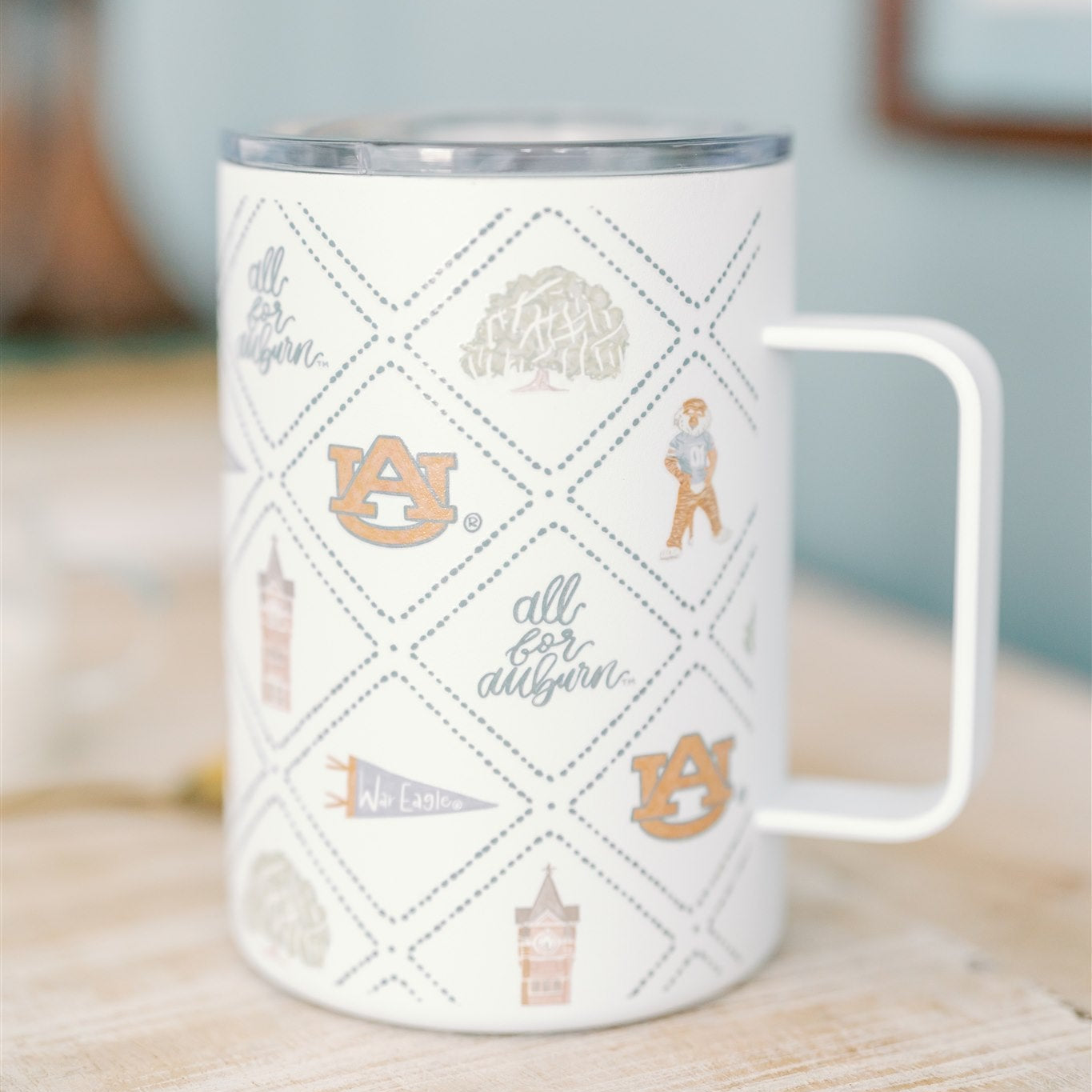 White Insulated Mug with watercolor Auburn University symbols.