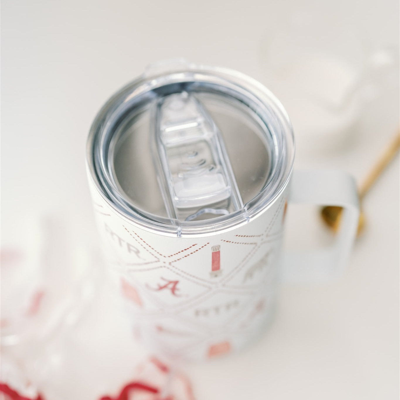 White Insulated Mug with watercolor University of Alabama symbols.