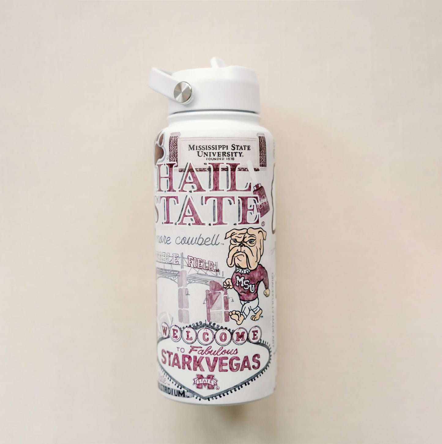 32 ounce water bottle with a white lid and is patterned with watercolor art of Mississippi State symbols.