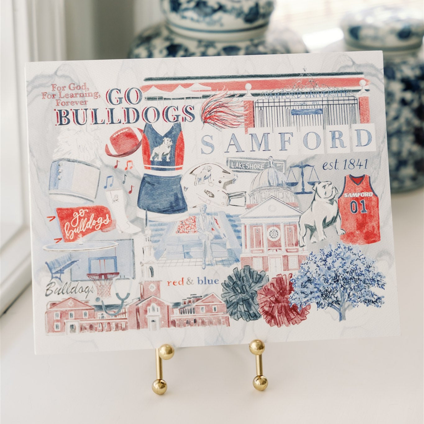 Watercolor art print of a collage of Samford University symbols and landmarks.