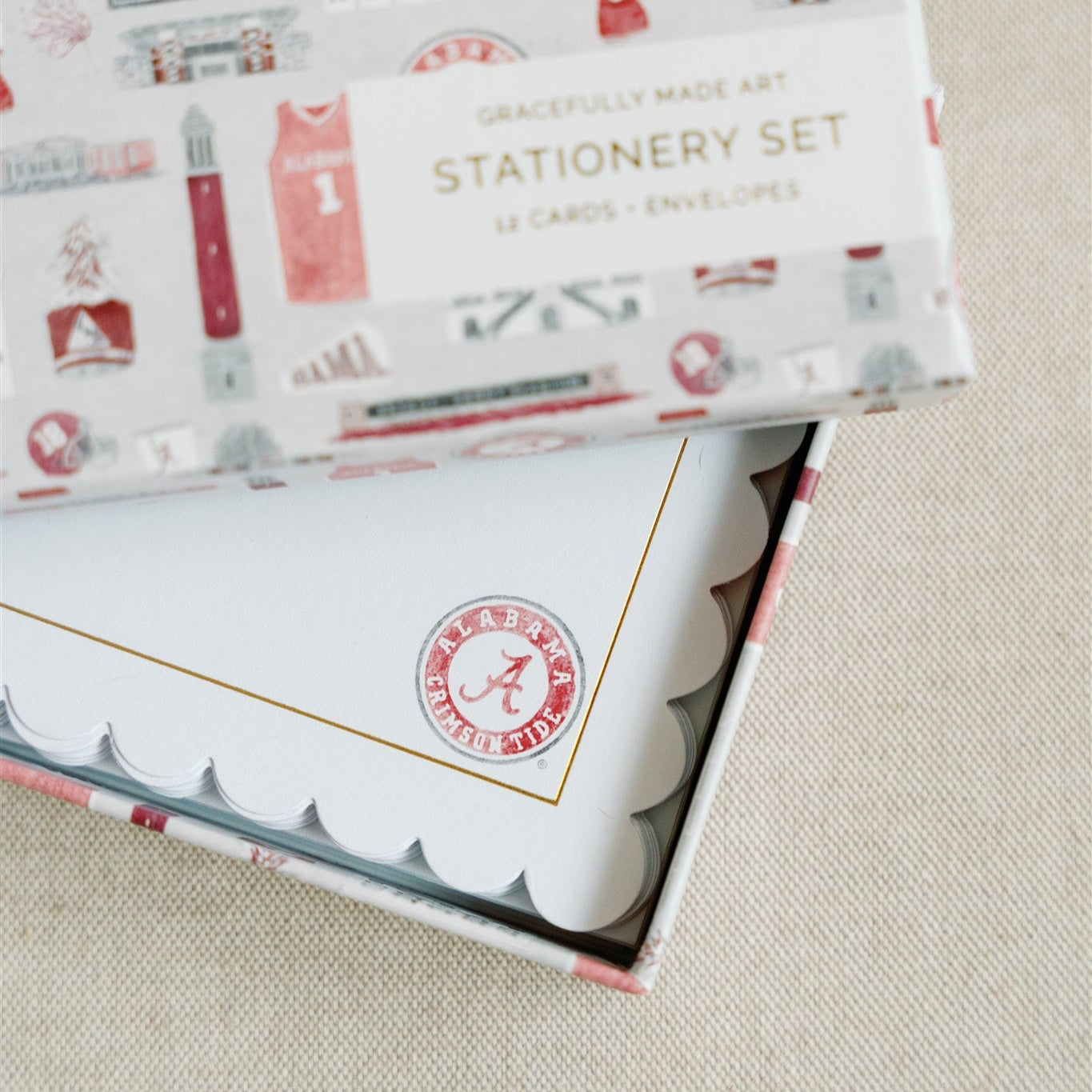 White notecards with a scalloped edge, gold detail, and University of Alabama logo.