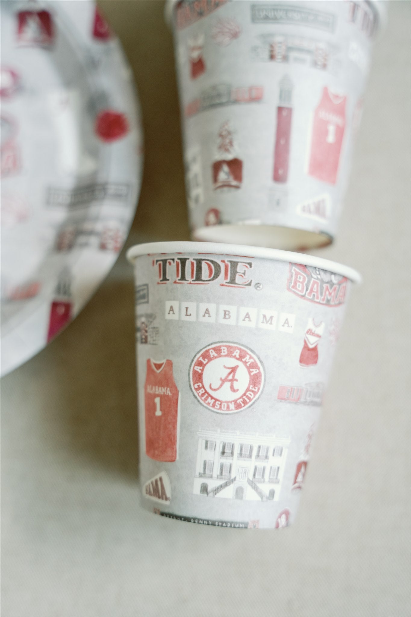 Light grey with watercolor University of Alabama symbols on them.