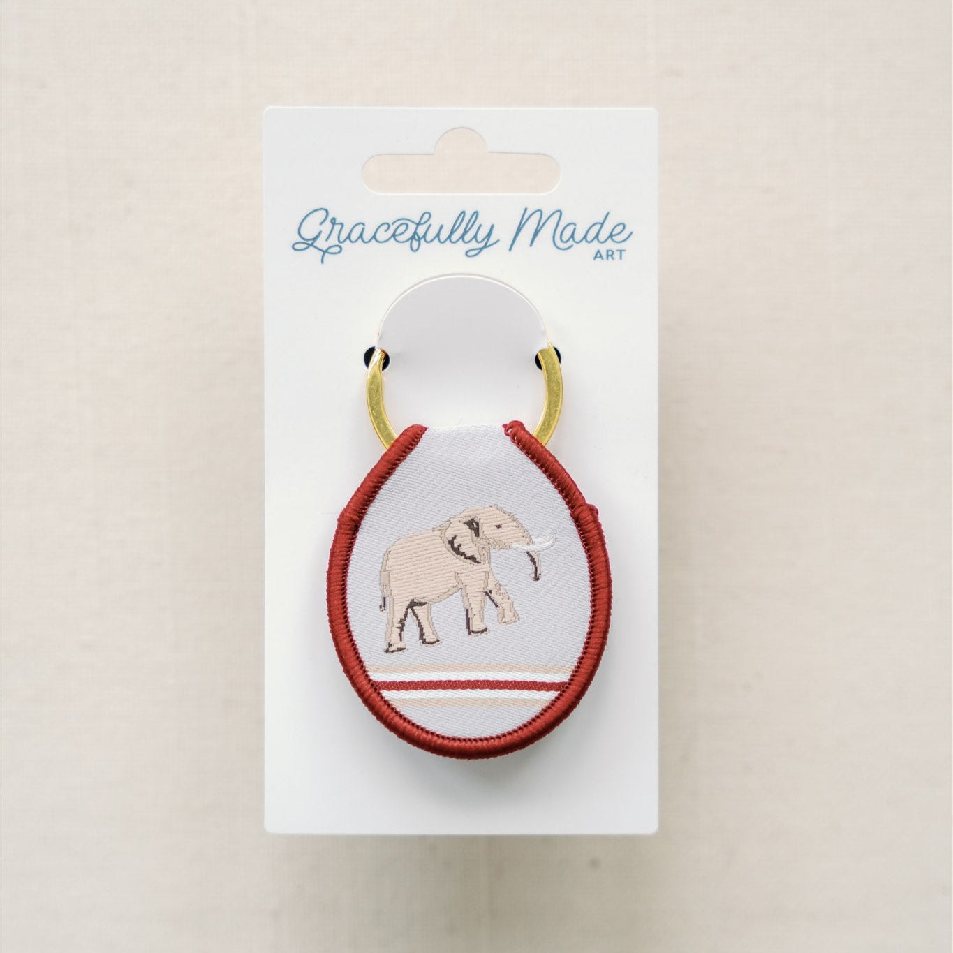 Embroidered Keychain of the University of Alabama elephant.