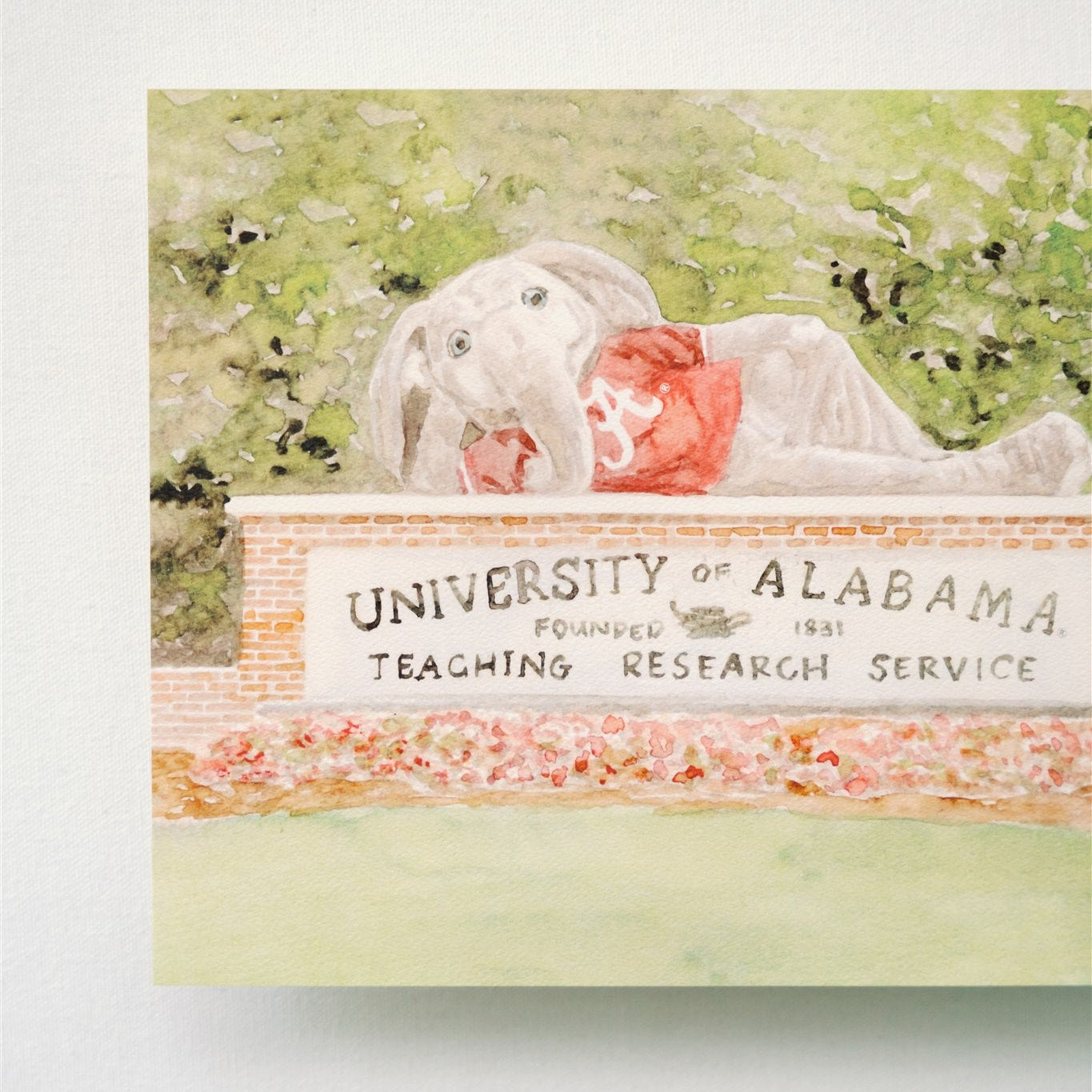 University of Alabama sign with Alabama's elephant mascot in the background