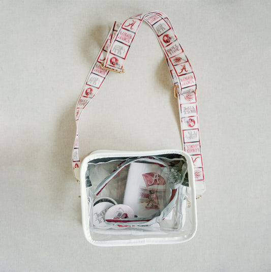 Clear bag with University of Alabama themed strap.
