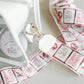 Clear bag with University of Alabama themed strap.