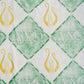 Blanket pattern with 'AXO' symbols on a checkered green and white background