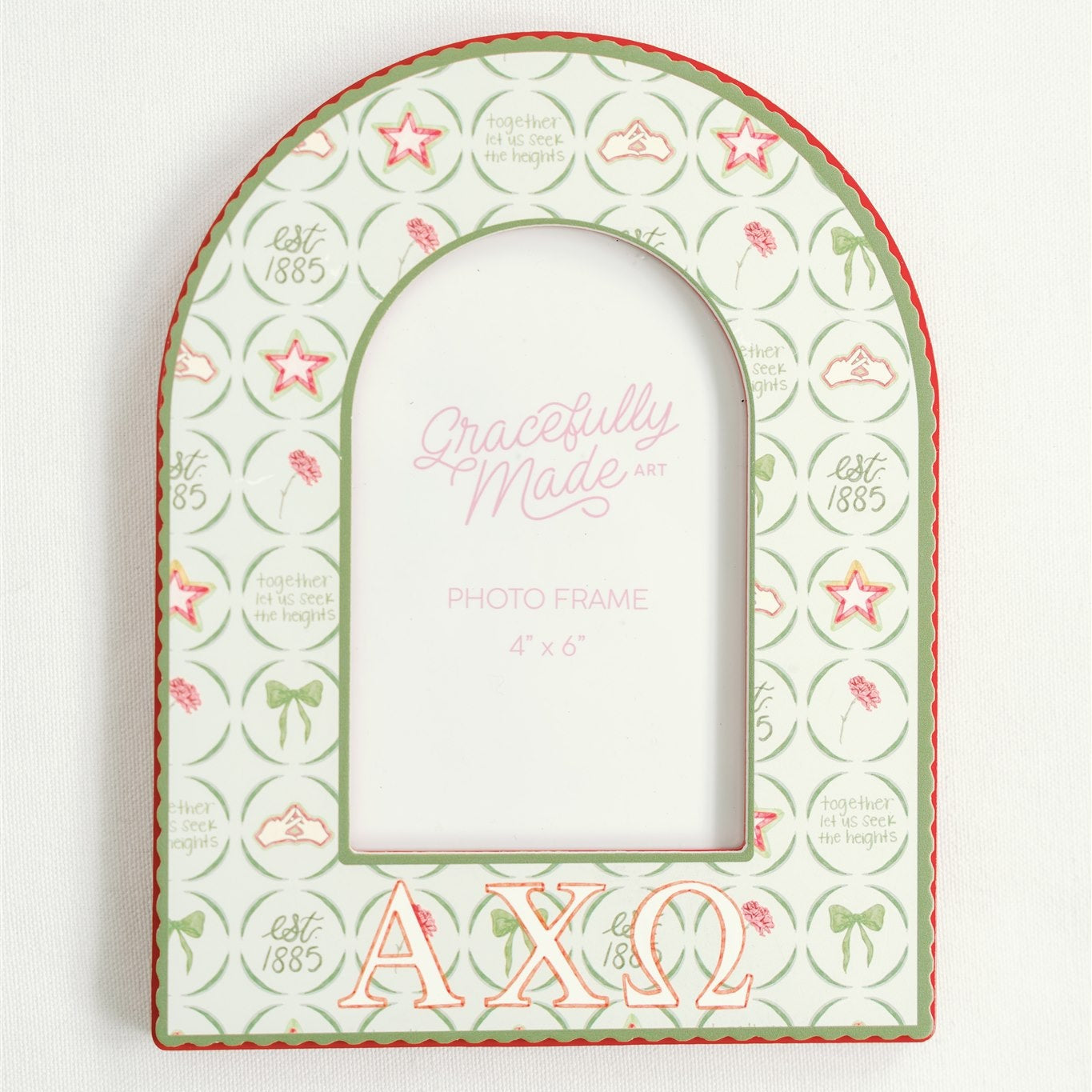 Decorative arch-shaped frame with 'Alpha Chi Omega' initials on a white background