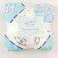 Folded flannel fleece blanket with a light blue background and Alpha Delta Pi Greek letters