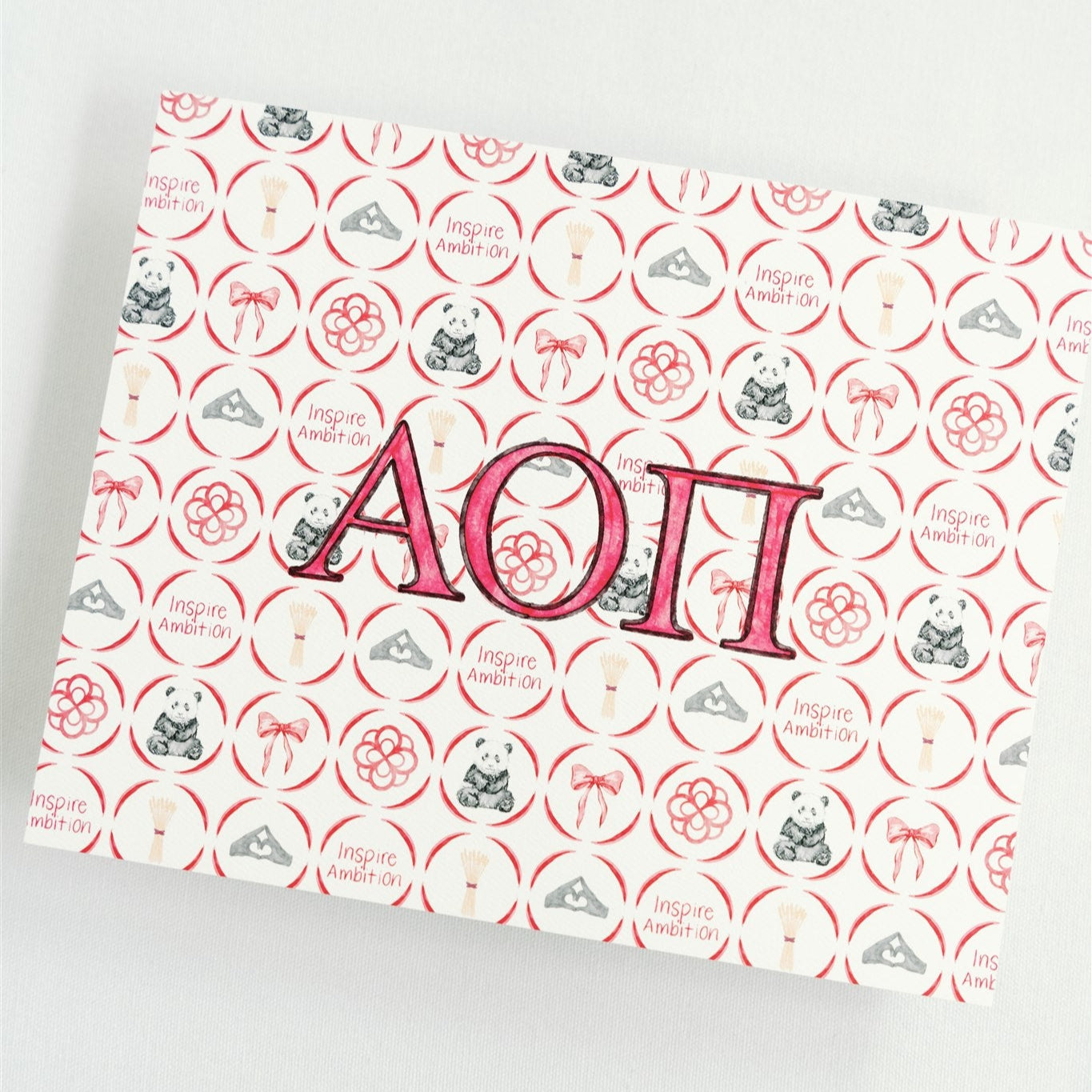 Art print with Alpha Omicron Pi Greek letters on a decorative background.