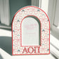 Arched photo frame with Alpha Omicron Pi pattern and Greek letters.