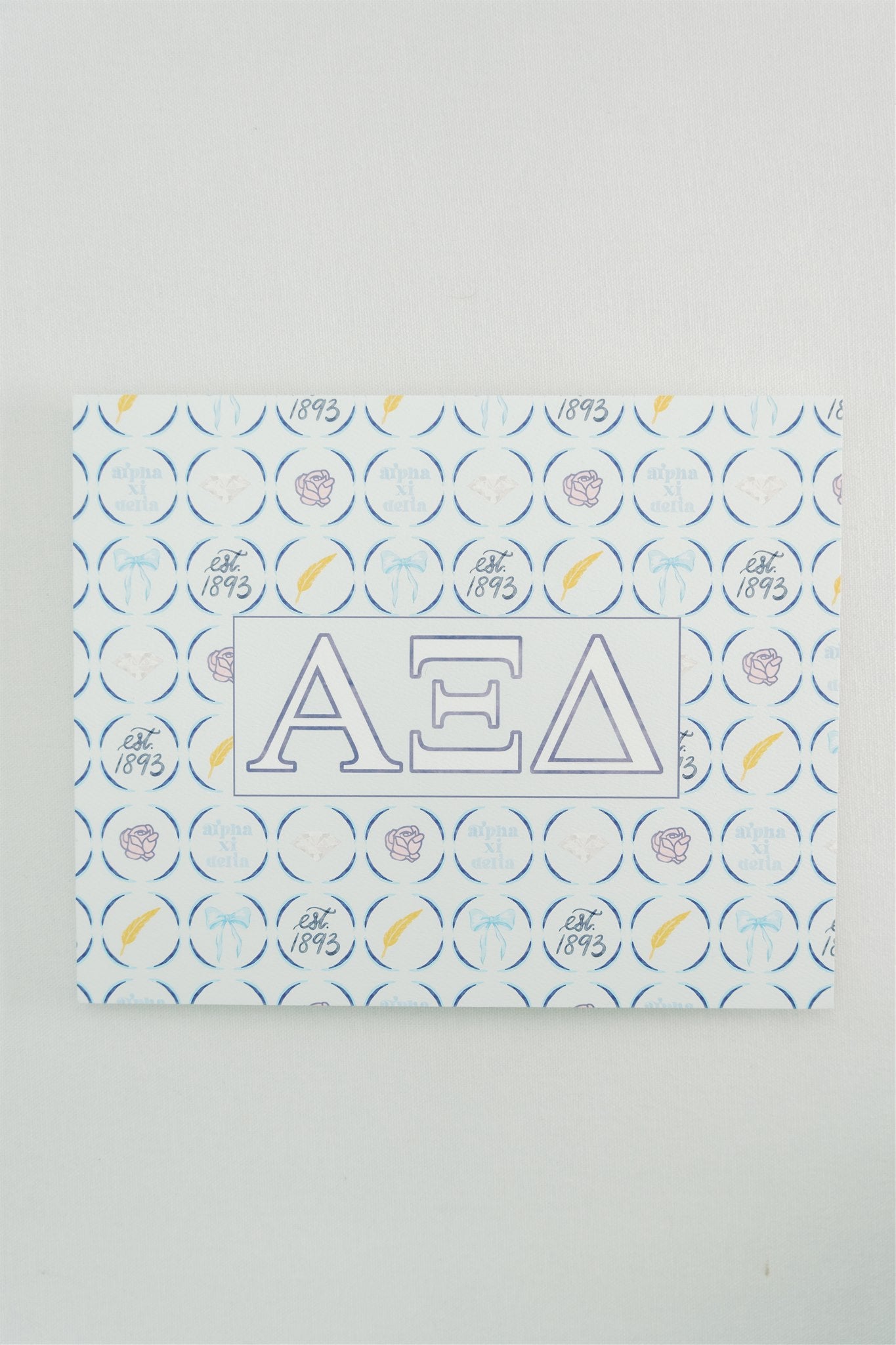 Art print with Alpha Xi Delta Greek letters and pattern on a white background.