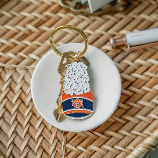 Enamel Keychain of the Auburn University Marching Band Hat with a gold chain.