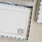 Stationery with scalloped edges, a gold rim, and a watercolor Auburn logo.