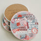 Ceramic coasters featuring a collage of watercolor University of Alabama symbols.