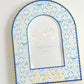 Decorative photo frame with Tri Delta pattern and Greek letters on a white background