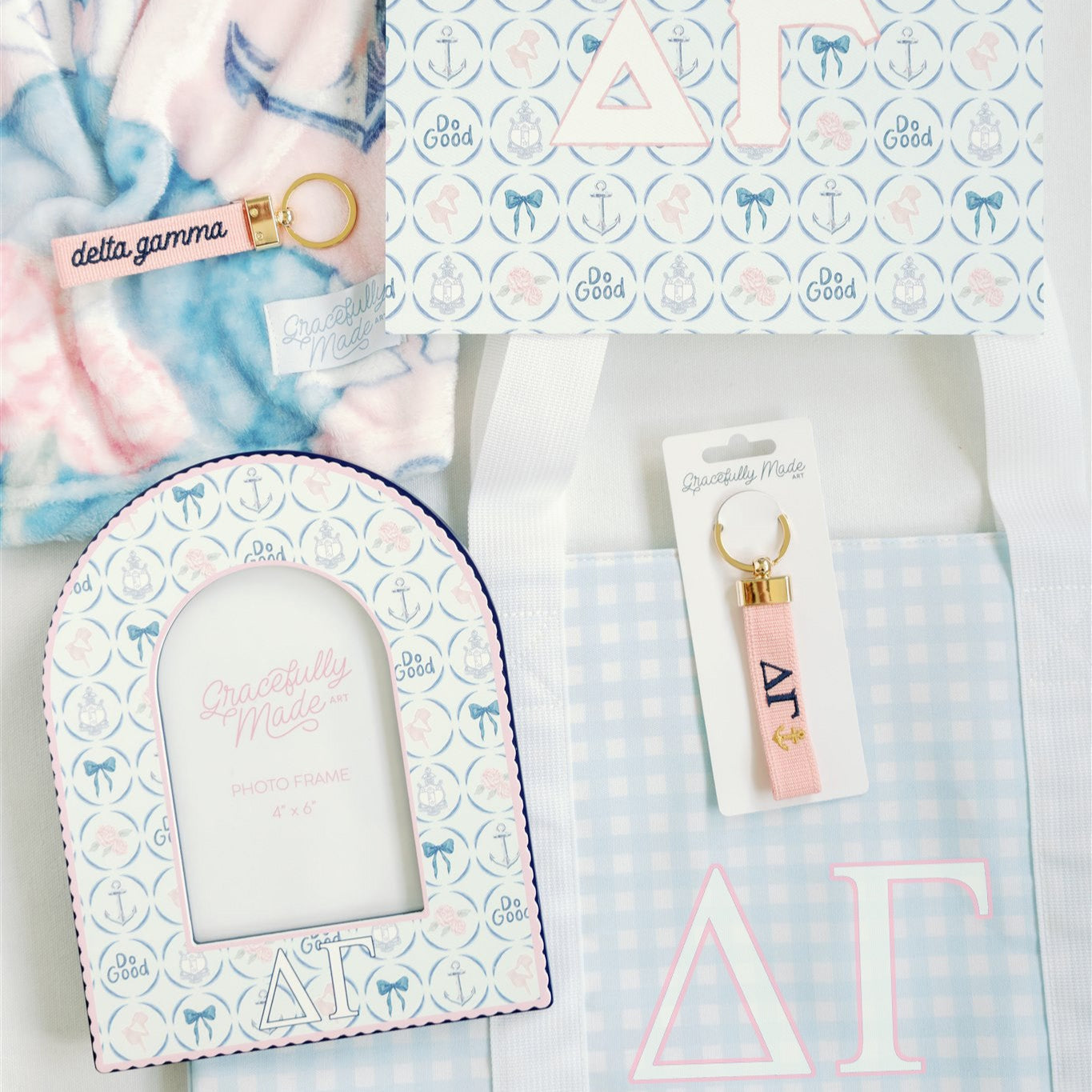 Collection of Delta Gamma themed products including a photo frame, keychain, and blanket on a white background.