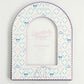 Decorative photo frame with Delta Gamma patterns and text on a white background