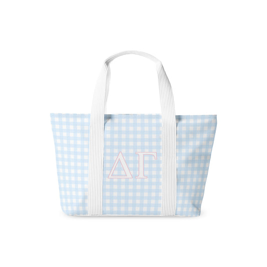Tote bag with blue and white checkered pattern and Delta Gamma Greek letters on a white background