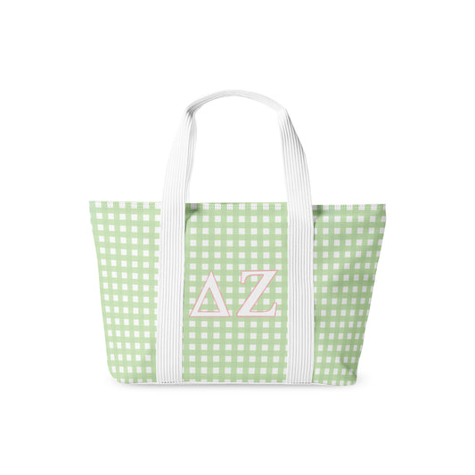 Green and white checkered tote bag with 'Delta Zeta' initials on a white background