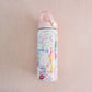18 ounce insulated water bottle with light pink lid and watercolor Taylor Swift symbols.