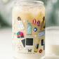 Clear glass with Taylor Swift symbols on it.