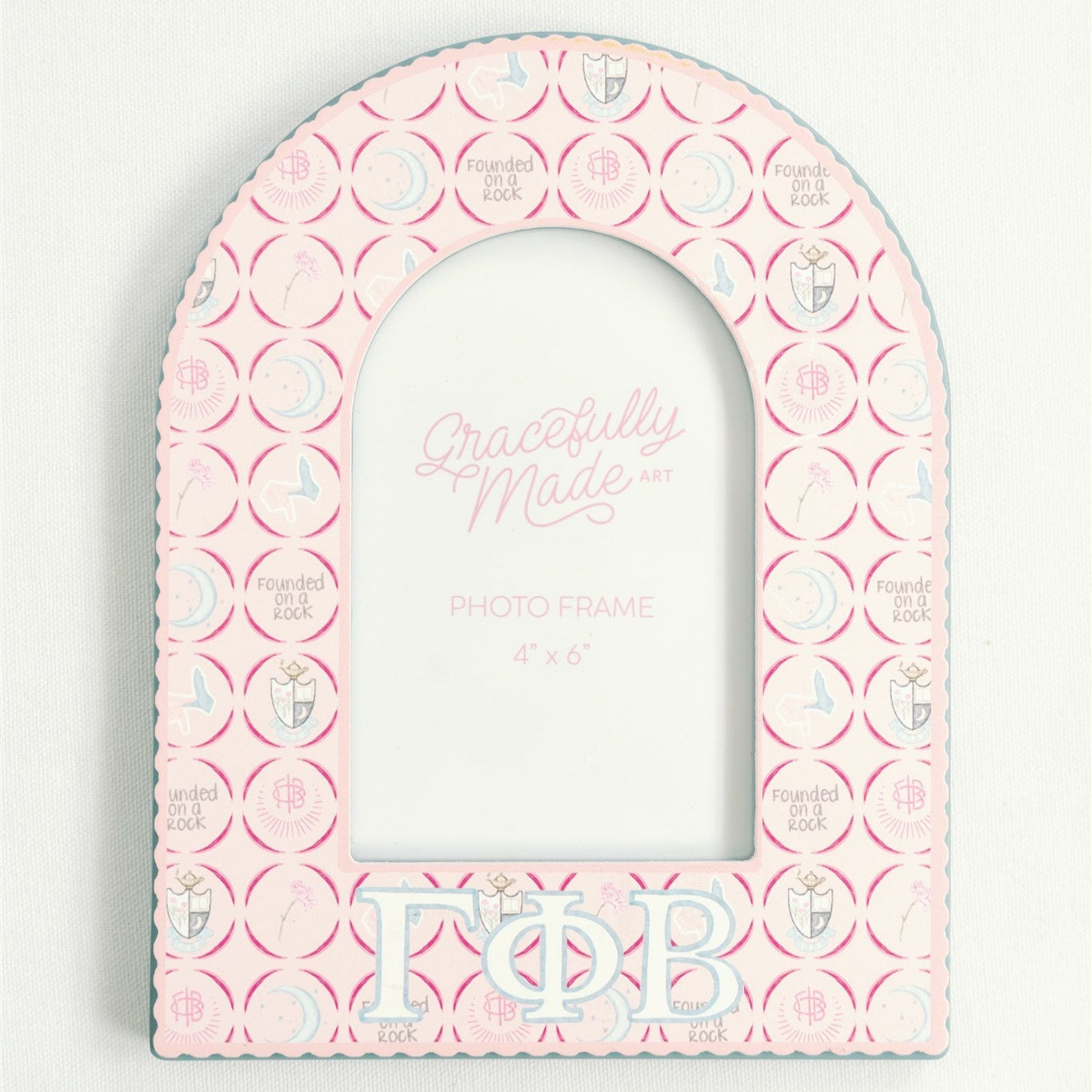 Pink arch-shaped photo frame with 'Gracefully Made' branding and 'Gamma Phi Beta' Greek letters.