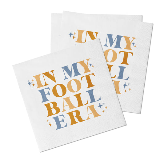 White napkin with "In My Football Era" written in orange and blue.