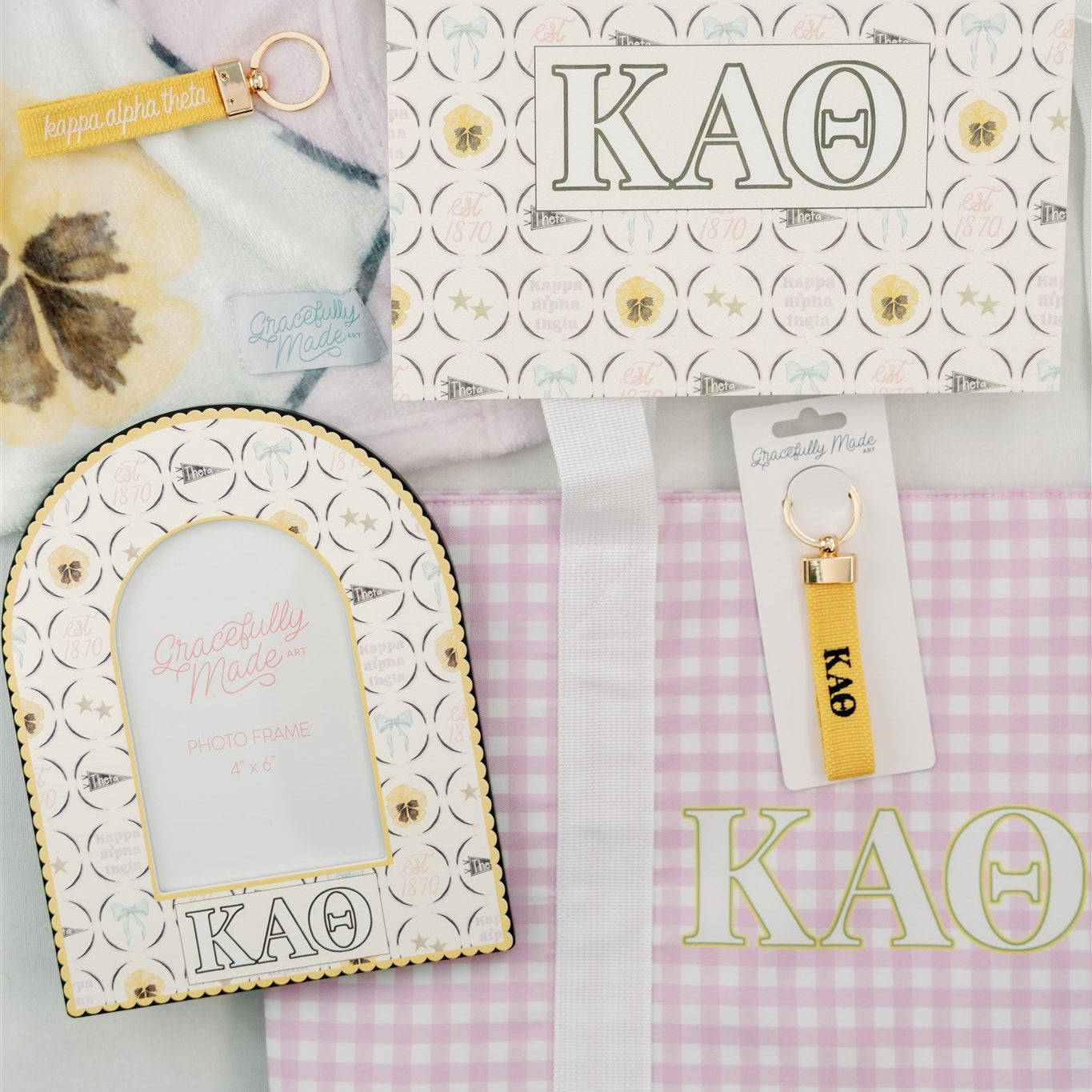 Decorative items with Kappa Alpha Theta Greek letters and colors including a photo frame and art print.