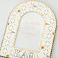 Arched photo frame with Kappa Alpha Theta pattern and Greek letters on a white background.