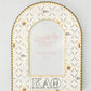 Decorative photo frame with Kappa Alpha Theta pattern and Greek letters on a light gray background