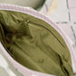 Close-up of the Kappa Alpha Theta tote bag's green interior liner.
