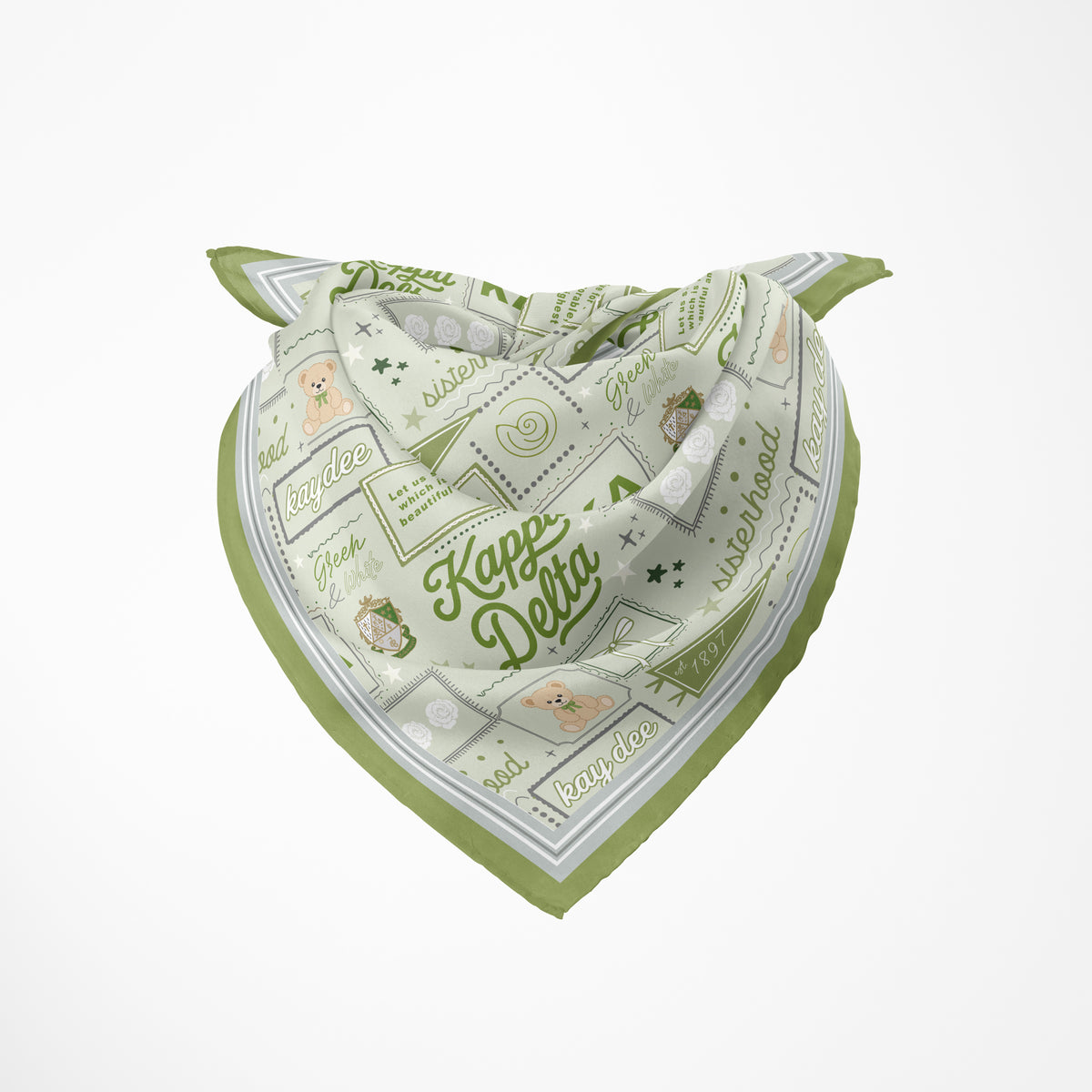 A square bandana-style scarf with a green and white collage print featuring the words 'Kappe Delta' and small illustrations such as a teddy bear and stars.