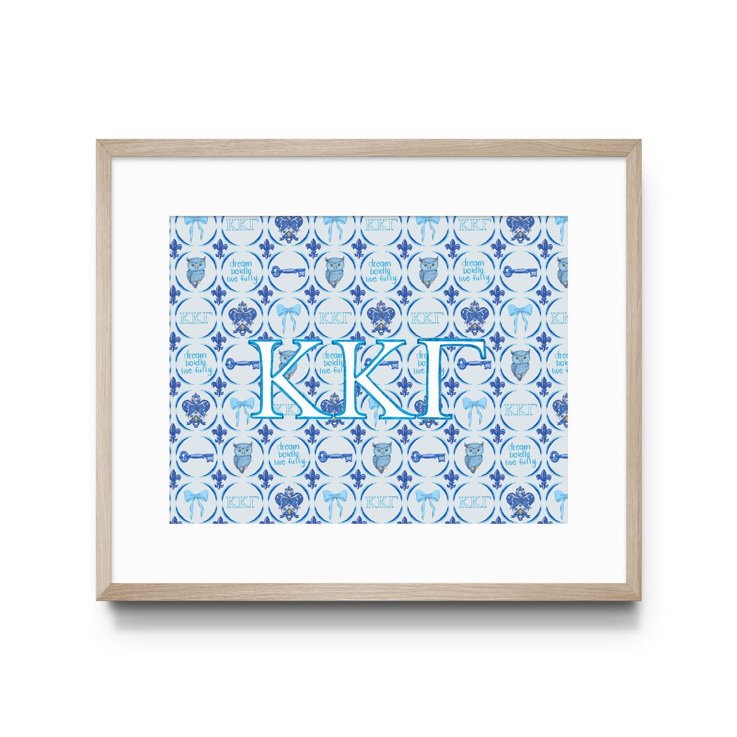 Framed artwork with blue and white pattern and Kappa Kappa Gamma Greek letters on a white background