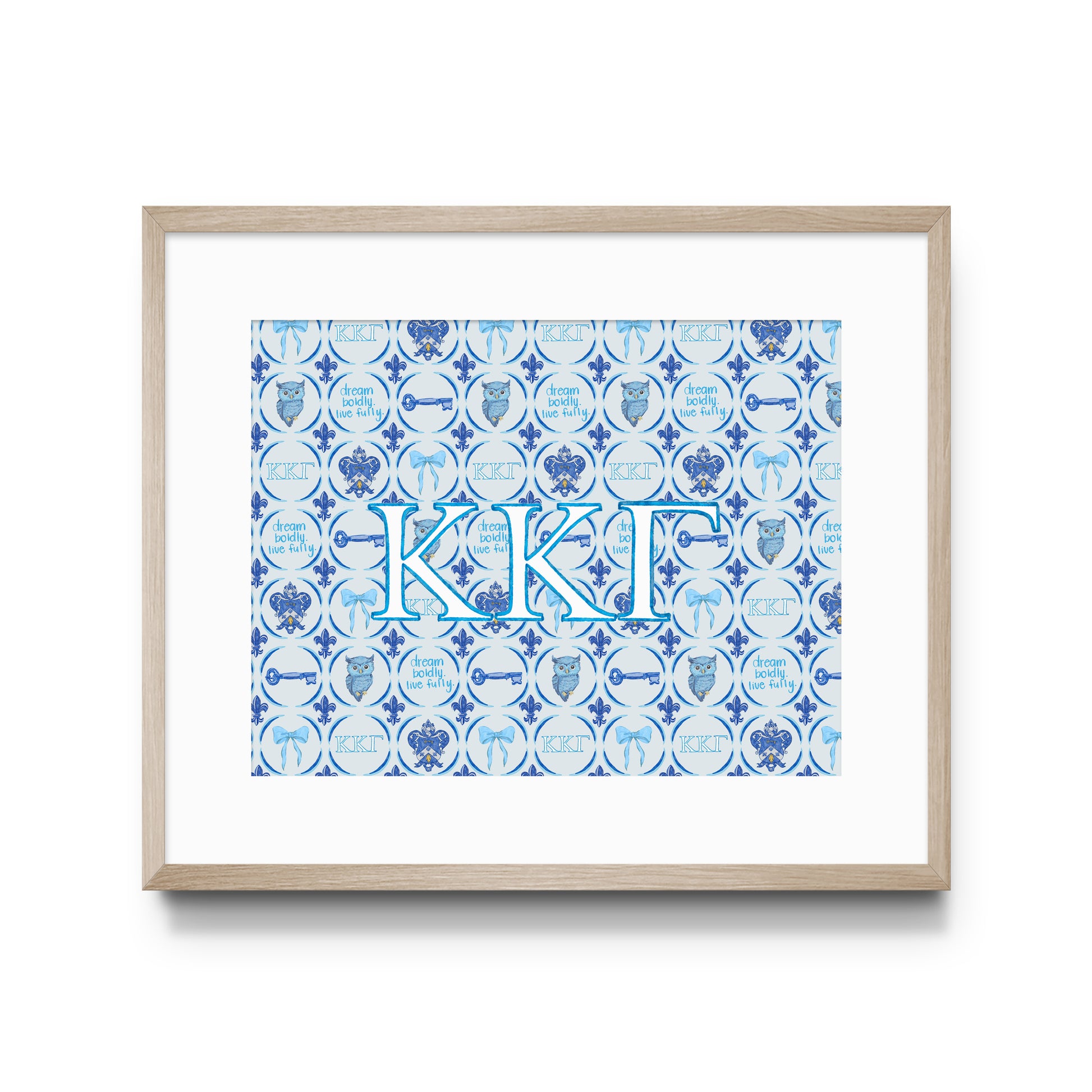 Framed artwork with blue and white pattern and Kappa Kappa Gamma Greek letters on a white background