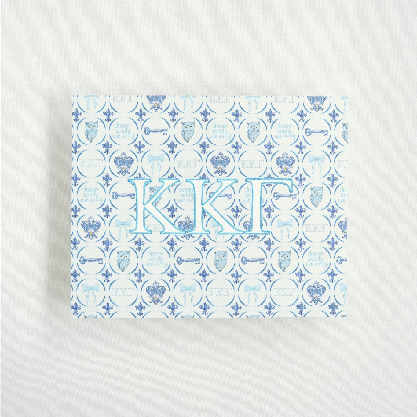 Watercolor art pring with decorative blue pattern and Kappa Kappa Gamma Greek letters on a white background