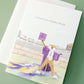 Graduation-themed card with LSU's mascot in a cap and gown on a green background