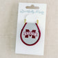 A light grey and maroon keychain with the Mississippi State logo embroidered on it.