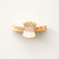 Decorative hair clip with scalloped edge on a white background