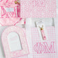 Collection of pink and white items with Phi Mu Greek letters on a white background