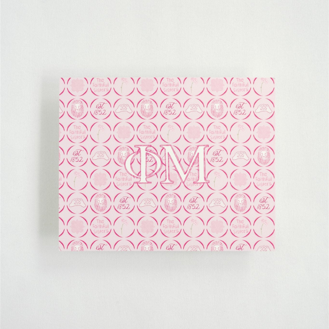 Pink and white patterned art print with Phi Mu Greek letters on a light gray background