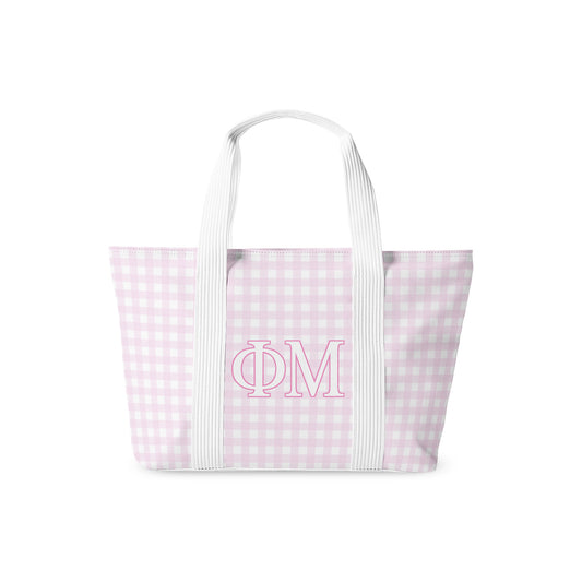 Tote bag with pink and white checkered pattern and 'Phi Mu' Greek letters on a white background