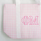 Pink and white checkered bag with 'Phi Mu' Greek letters and white straps.